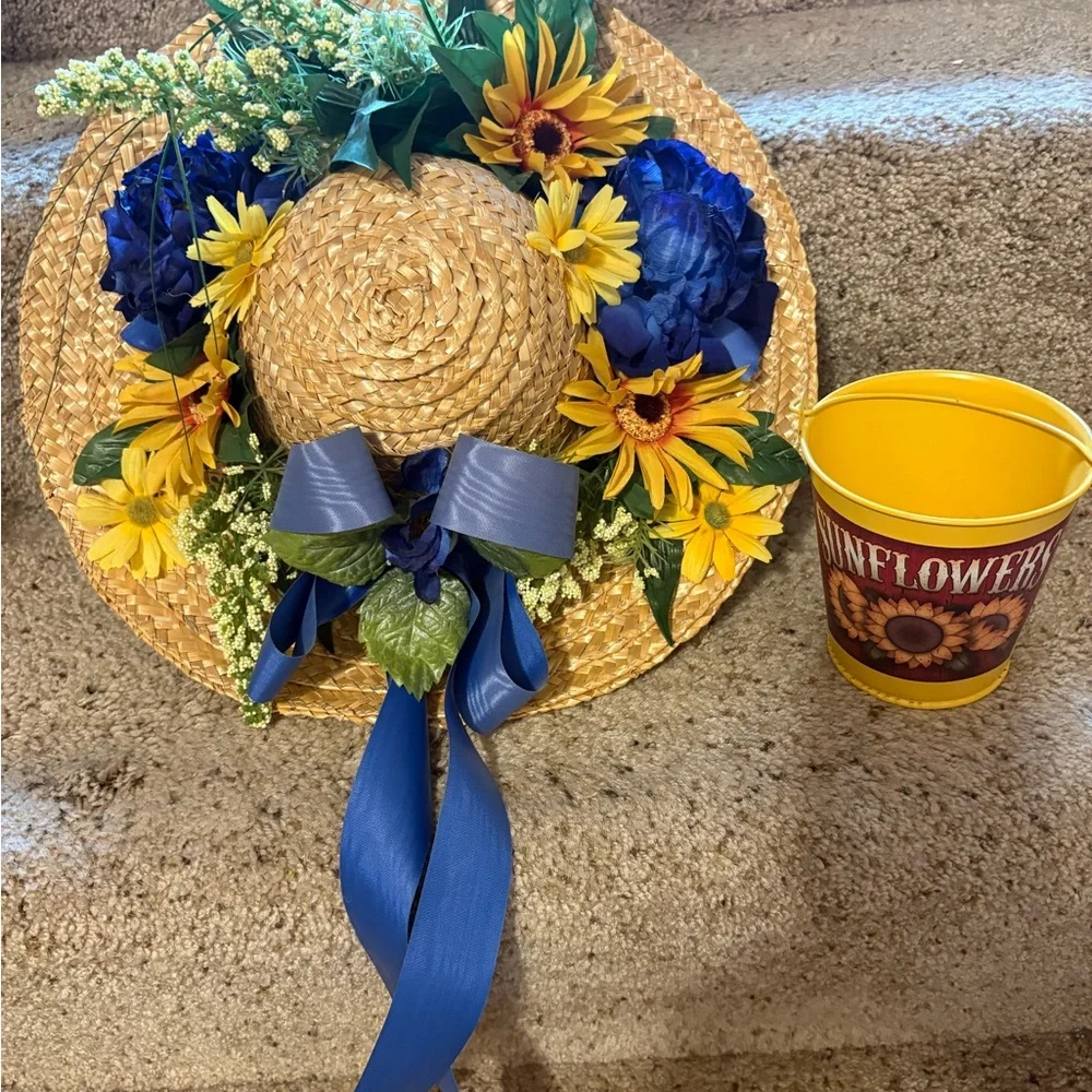 Pretty vintage sunflower straw hat with a sunflower bucket.